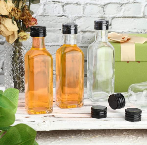 750ml Round Olive Oil Glass Bottle with Customized Black Screw Cap and Transparent
