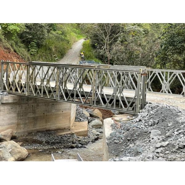Compact portable Bailey Bridge providing easy handling and rapid setup for temporary crossings and infrastructure support