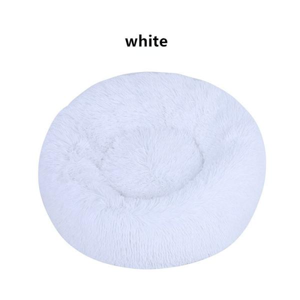 Розовая пушистая циновка кровати собаки вокруг поставок любимца пусковой площадки собаки зимы дома любимца теплых
