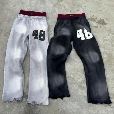 Homem personalizado Streetwear Distressed Acid Wash Pantalões de suor desdobrados Homens Saco Pantalões de suor de cintura dupla
