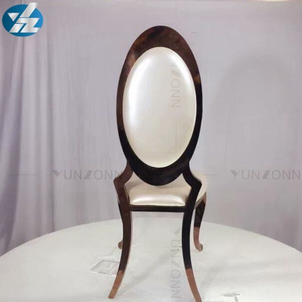 Oro de la venta directa de la fábrica que apila la silla del banquete