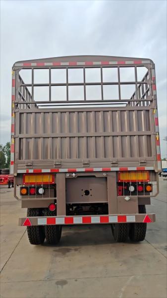 CIMC iron material 3 axles 40-80 Tons Capacity Stake Type Heavy cargo van type High Fence Warehouse Semi truck trailer