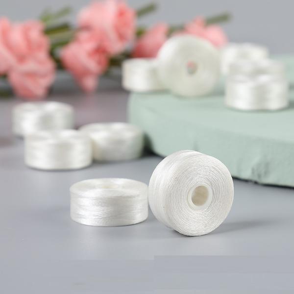 Диаметр 2 см Вышивка Нижняя нить Белая безграничная L-тип 75D/2 Шаттл Ядро Шитье Преглубокое Боббин 6