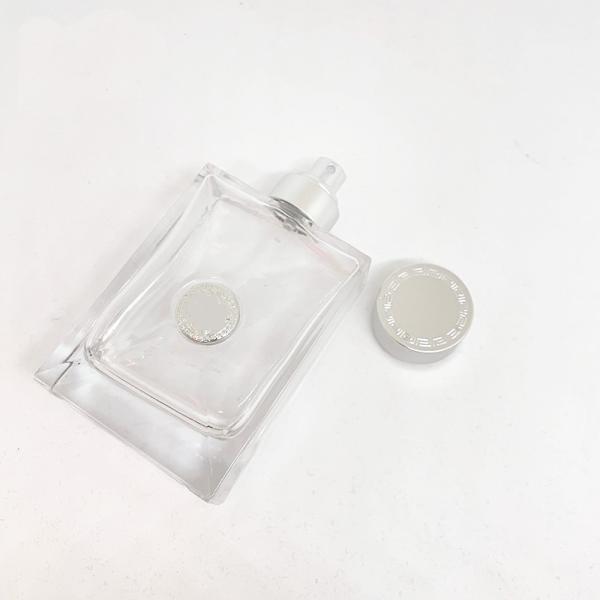 Bouteille de parfum créative 100ml avec la vente en gros d'usine de matériau d'emballage de parfum de chapeau de zamak