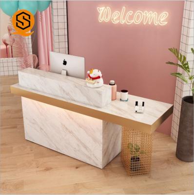 Mesa de recepção de superfície contínua do salão de beleza luxuoso de Front Counter Marble Gold Metal do escritório