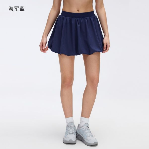 White High Waist Bubble Hem Tennis Skirt with Built-in Shorts for Active Wear