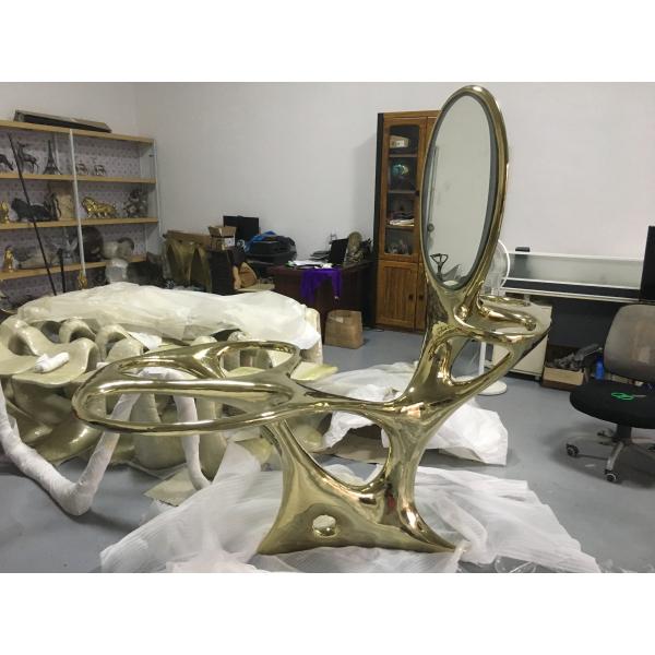 Stainless steel sculptural table with abstract style dresser interior decoration