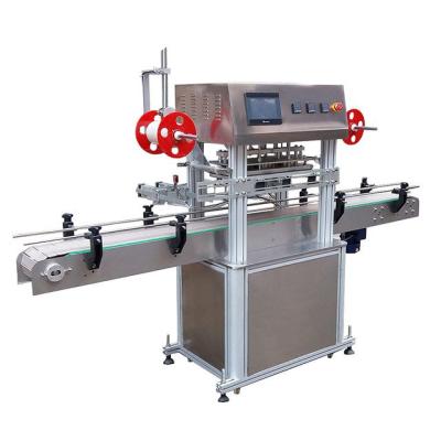 Máquina de vedação automática de quatro garrafas 1400-1800 garrafas / hora