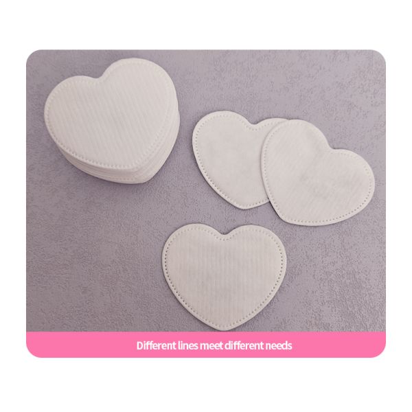 Discos de algodón desechables biodegradables en forma de corazón ecológicos OEM para desmaquillar