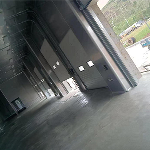 380V 220V Industrial Sectional Door Convenient Operation For Vehicle Service Centers