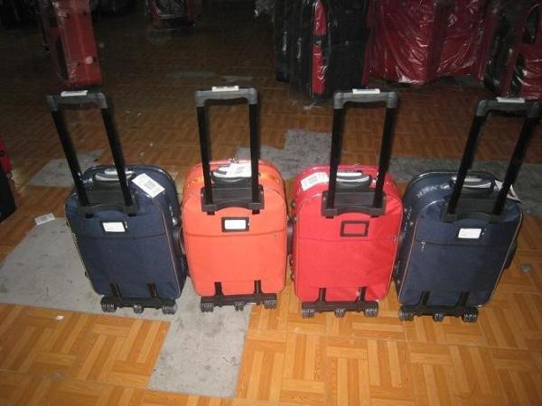 EVA Four Piece Carry On Luggage Set 8 Wheels With Silver Color Handle Support