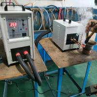 Machine automatique de durcissement par induction de bobines de cuivre avec système d'éteinture / poussée horizontal