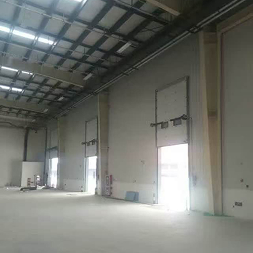24dB Insulated Custom Vertical-Lift Industrial Sectional Overhead Door For Facility Applications