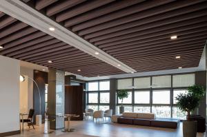 2/2/0.5mm Wooden Microperforated Acoustic Baffle Ceiling Tile Torsion Spring