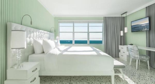 New Guinea hotel style apartment interior design furniture bedroom upholstered headboard bed with glossy white table set