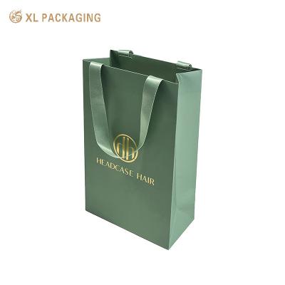 XL Packaging Custom Packaging Factory Custom Design Printed Shopping Gift Packaging Paper Bag With Your Own Logo Luxury Green Ribbon Thick Paper Bag For Clothes