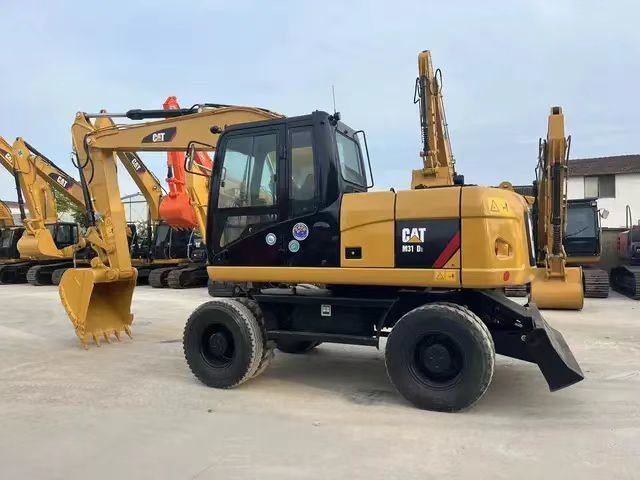 Колесный экскаватор CatM315D Отличная производительность и множество практических функций