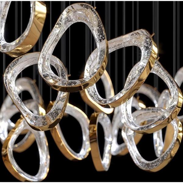 JYLIGHTING personalizado moderno círculo irregular colgante luz anillos transparentes colgando luz para Villa Hotel sala de estar