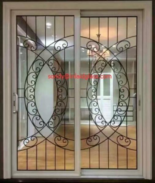Wrought iron glass panel with  12*12 black steel bar in sliding door