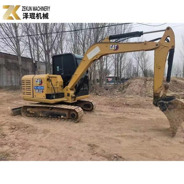 CAT 305.5E2 Excavateur à chenille de 5,5 tonnes utilisé avec pouce hydraulique de Caterpillar