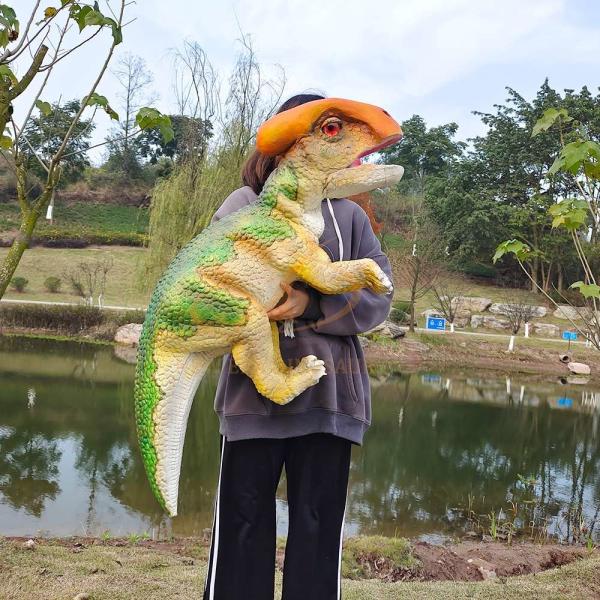 Títere de mano de dinosaurio bebé realista para espectáculos