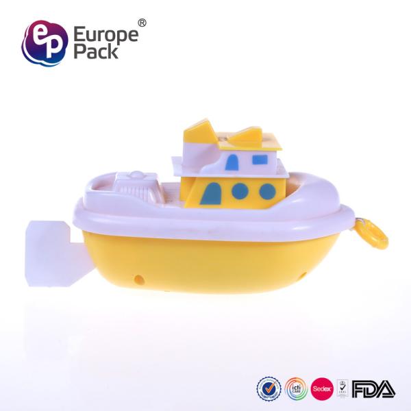 Plastic toy boat  pull line drives the boat  sailing