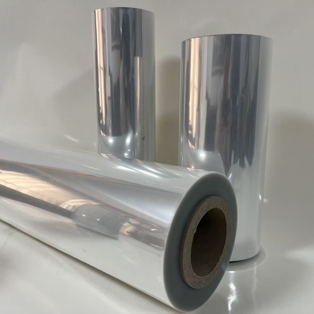 Industrial PETG Shrink Film Roll with 30μm-60μm Customized Thickness, 4000m Standard Roll Length, and TD Shrinkage for Packaging