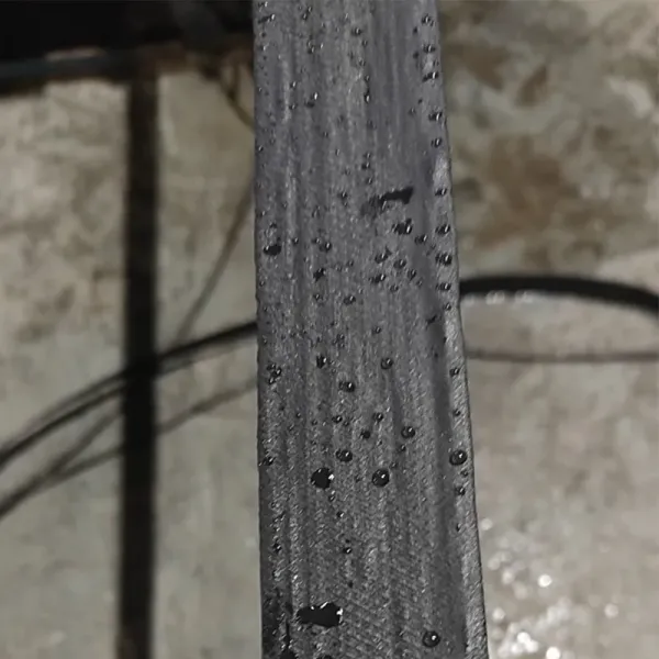Cost-Effective Polymeric Geocomposite Strip Geogrid for Reinforced Soil Structures