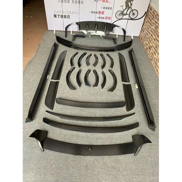 Kit de fibra de carbono de alta calidad Kit de cuerpo de Macan para Macan delantera y trasera faldas de lado spoiler cuerpo ancho