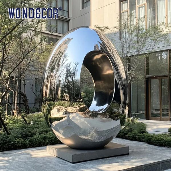 Polished Metal Egg Sculpture | Custom Landscape Art for Hotels, Resorts & Real Estate