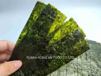 Umami ricos em flocos de alga torradas em pó para saladas de sushi e lanches