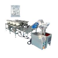 Machine d'emballage à plaques vibrantes à grande vitesse pour la production de petites pièces