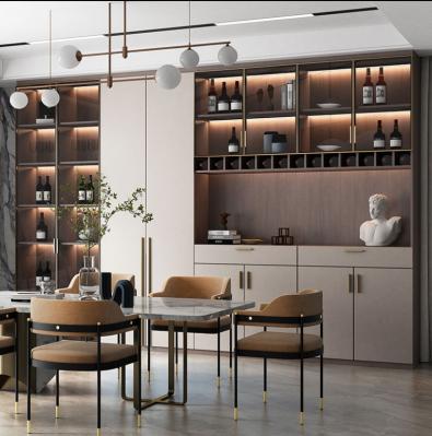 The Wine Cabinet With Khaki Door Panels Contains Yellow Led Lights