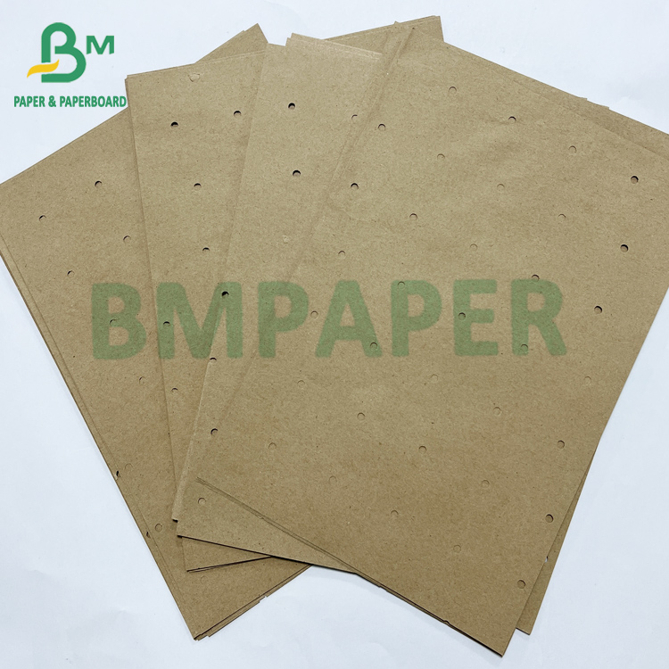 70gsm Recyclable Round Hole Perforating Underlay Kraft Paper For Garment Factory 70 гсм перерабатываемая круглая отверстие перфорирующая подкладка kraft бумаги для швейной фабрики