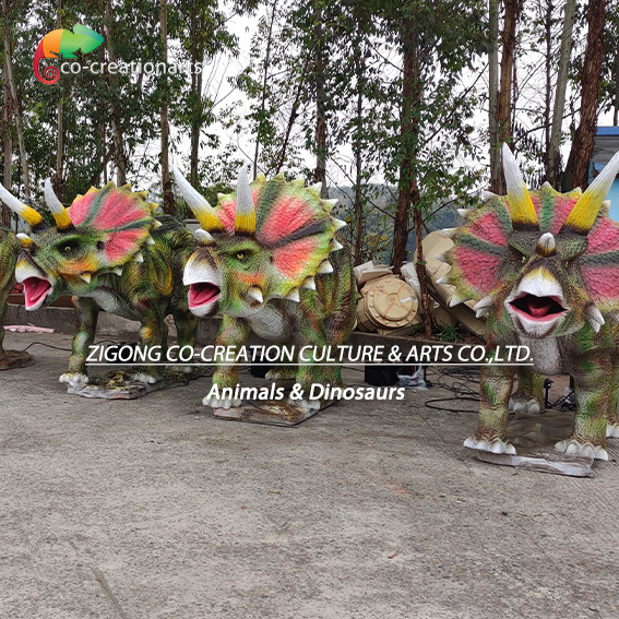 Realistic Animatronic Triceratops Trio: Vibrant Frills & Roaring Motion In Natural Setting