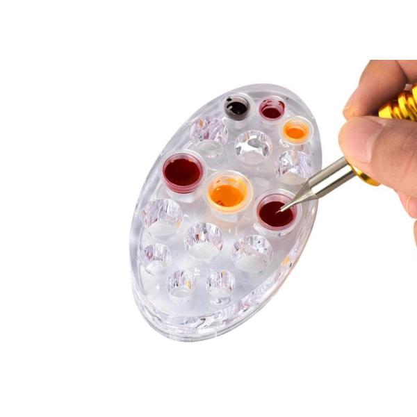 卸し売り透明な楕円形の顔料インク カップ・ホルダーは専門の構造の付属品のアクリルの入れ墨機械帽子を立てる