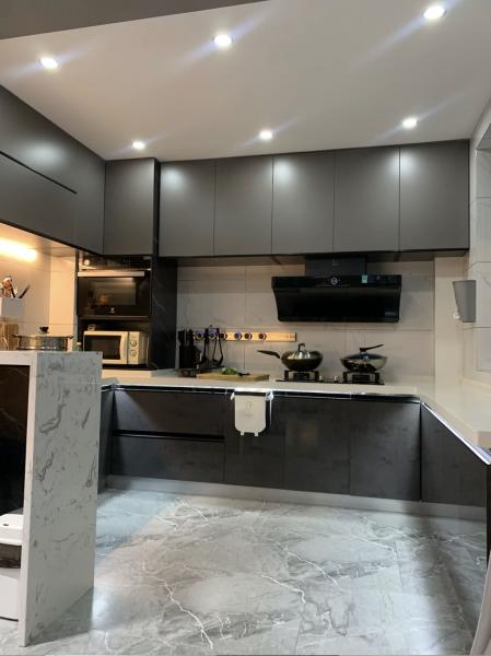 Modern Design Melamine Finish With Quartz Stone Waterfall Island Kitchen Cabinet