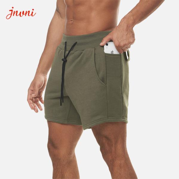 O Activewear dos homens Squatting do halterofilismo assenta o short do exercício do Gym com bolso