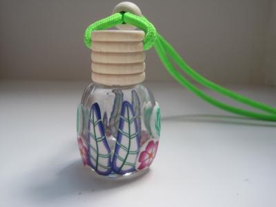 New style car perfume bottle hanger,polymer clay round glass bottle with wooden cover.