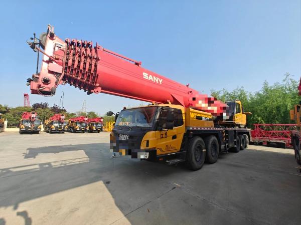 SA Ny Grue de camion mobile de 100 tonnes Conception pliante de haute capacité Certification ISO9001