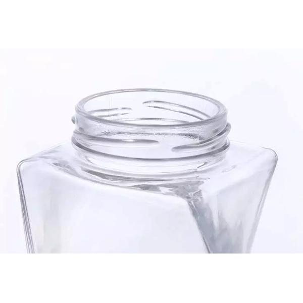 Стеклянная банка для хранения водки вместимостью 330 мл и металлическим крышкой