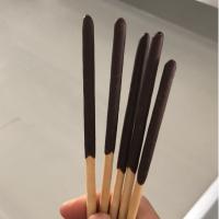 Papa, machine entièrement automatique pour faire tremper et recouvrir le chocolat.