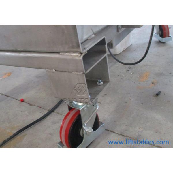 A tabela de elevador estacionária elétrica hidráulica de aço inoxidável Scissor a plataforma de levantamento