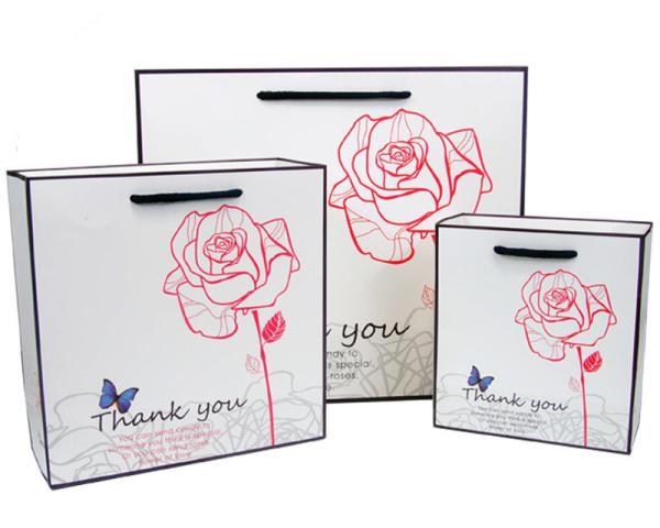 Custom Luxury White Paper Carry Bag With Artwork Printing Manufacturers