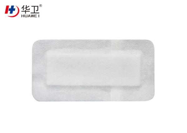 Adhesive non-woven wound dressing for wound healing with high absorbent pad