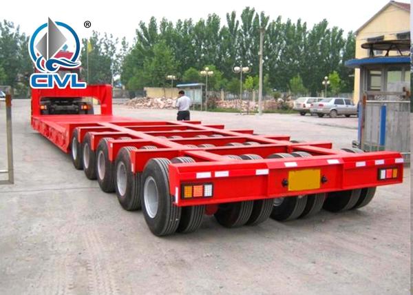3 Line 6 Axles Fuwa Axles Low Bed 100T Semi Trailer Trucks For Equipment Transportation