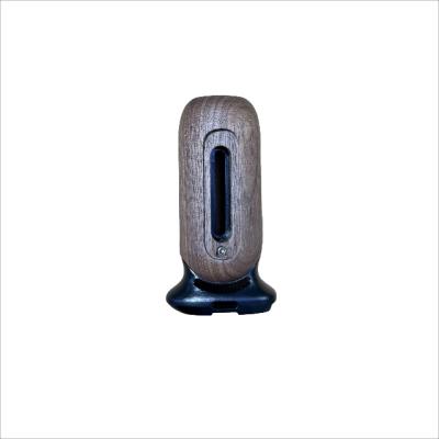 Wooden camera side grips are used in cage systems for mirrorless or SLR cameras as an auxiliary holding accessory for handheld