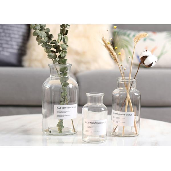 La característica elegante del florero de cristal redondo transparente modificó servicio para requisitos particulares