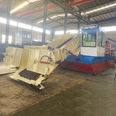 Afrique 10 Récolteuse aquatique de mauvaises herbes de capacité cube avec système hydraulique Pour les zones d'eau modérée