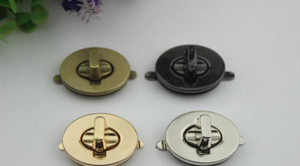 Guangzhou bag oval shape hardware zinc alloy silver color metal twist turn lock for purse